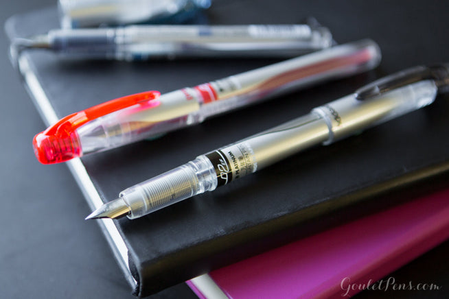 Platinum Preppy Extra-Fine pen uncapped and capped on black notebook