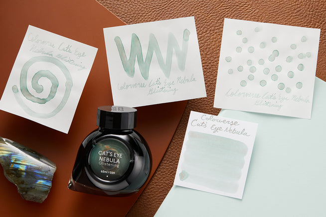 Colorverse Cat's Eye Nebula Glistening swabs and bottle on wooden desk backroung