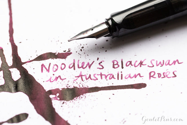 Noodler's Black Swan in Australian Roses ink splatter and LAMY AL-star