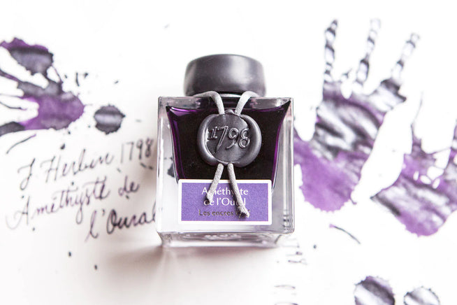 Jacques Herbin 1798 Amethyste de l'Oural Ink splatter and LAMY AL-star