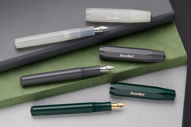 Assorted Kaweco fountain pens on a desk