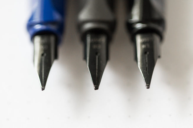 3 uncapped LAMY fountain pens