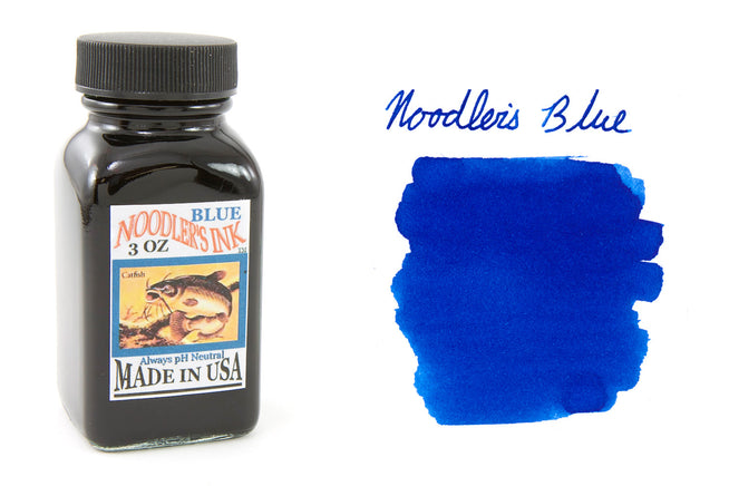 Noodler's blue fountain pen ink bottle and swab