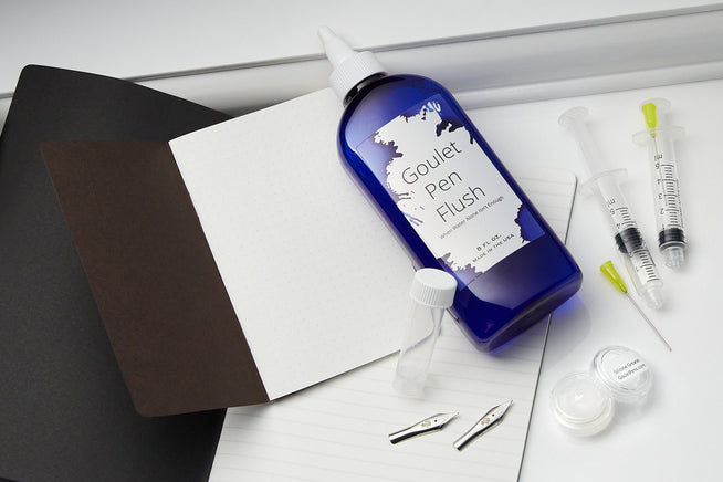 Goulet cleaning kit featuring pen flush, syringes and silicone grease