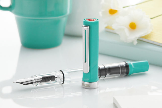 Persian Green TWSBI ECO fountain pen on a clear desk