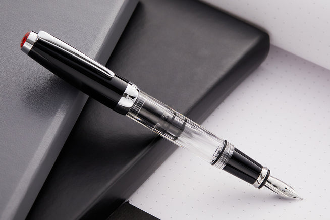 TWSBI Mini Classic uncapped on notebook