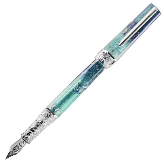A decorative fountain pen with a translucent teal and blue body containing embedded gold foil flakes, featuring a polished silver nib and matching silver metal accents.