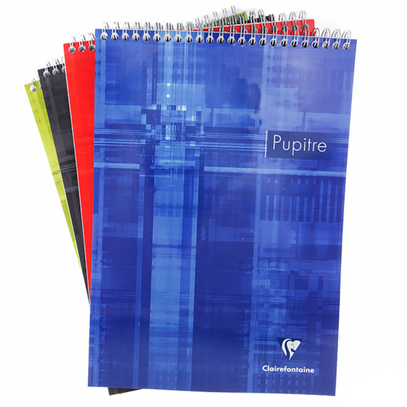 Set of four spiral-bound notebooks with different colored covers on a white background