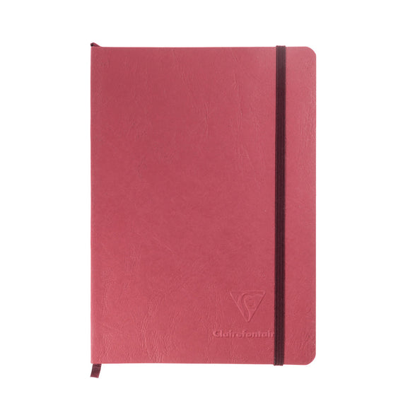 Red notebook with a black strap on a white background