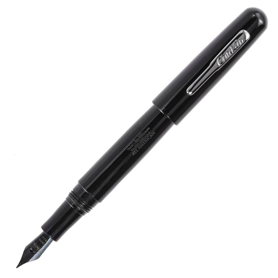 Black fountain pen on a white background