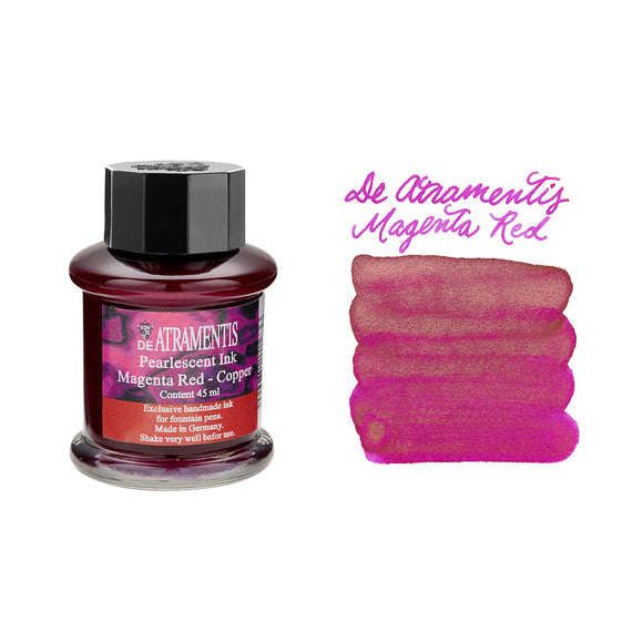Bottle of De Atramentis Pearlescent Ink with magenta color swatch on a white background