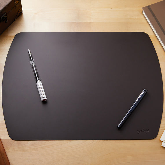 This dark brown leather writing mat provides a comfortable and durable surface for writing, protecting your desk from ink and adding a touch of elegance to your workspace.
