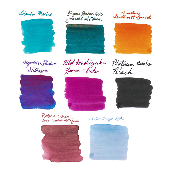 Collection of ink swatches in various colors with brand names labeled on a white background