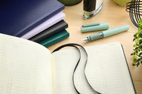 Leuchtturm1917 Medium A5 2026 Weekly Planner & Notebook - Forest Green, Lined