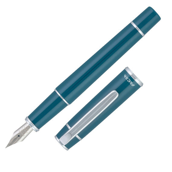 Blue fountain pen with cap on a white background