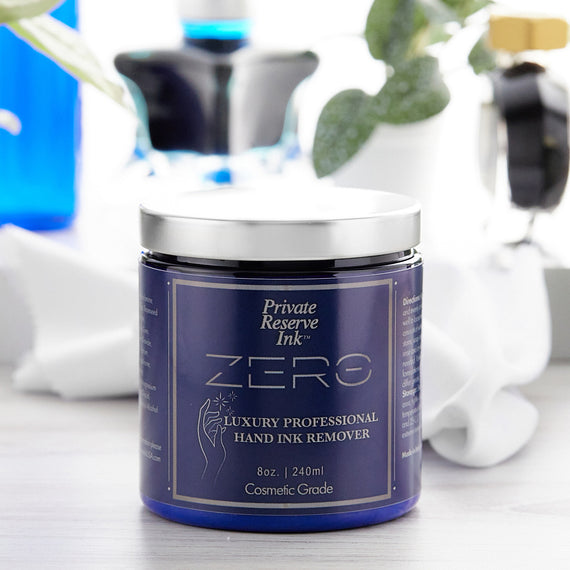 Jar of Private Reserve Ink Zero Luxury Professional Hand Ink Remover on a blurred background