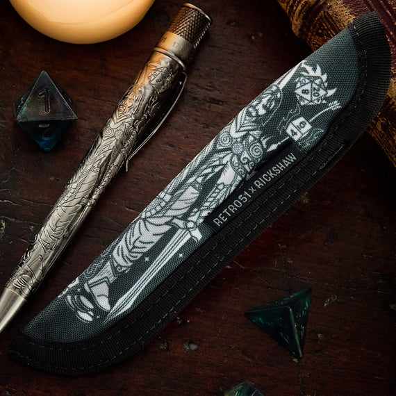 Single black pen case with white design on a wooden background with a silver pen