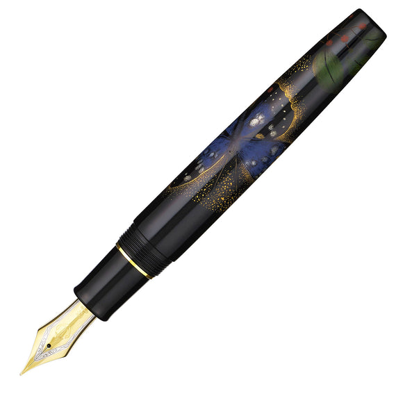 Fountain pen with decorative black and gold design on a white background