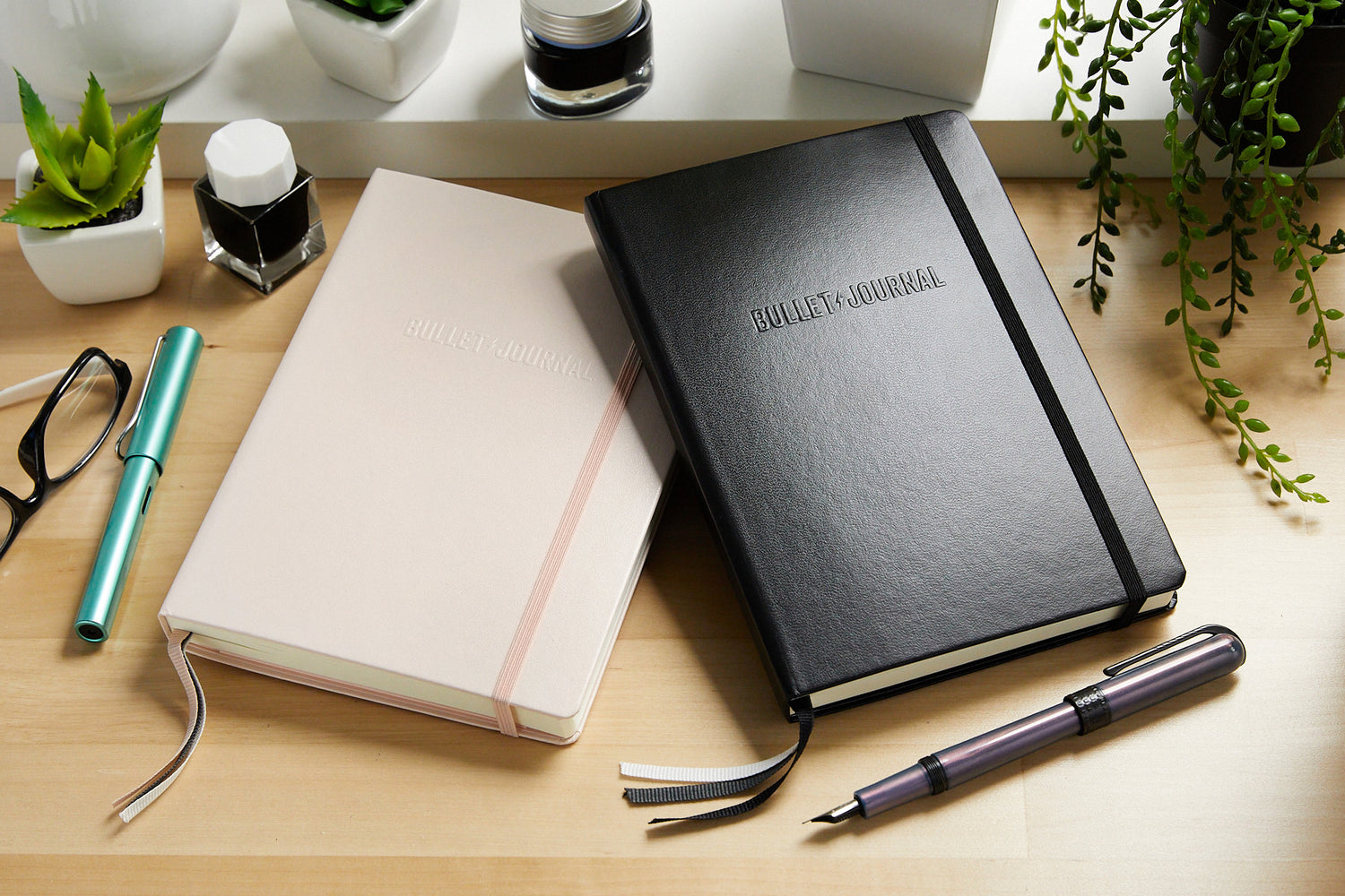 https://www.gouletpens.com/cdn/shop/products/Leuchtturm1917-BulletJournalNotebook-Black-Blush-group-1_1500x.jpg?v=1625688860